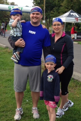 Howie, Sacks & Henry Articling Student and Brain Injury Survivor, Michael Blois, with his wife, Becky Fletcher and his children, at the 2014 BIST Run.