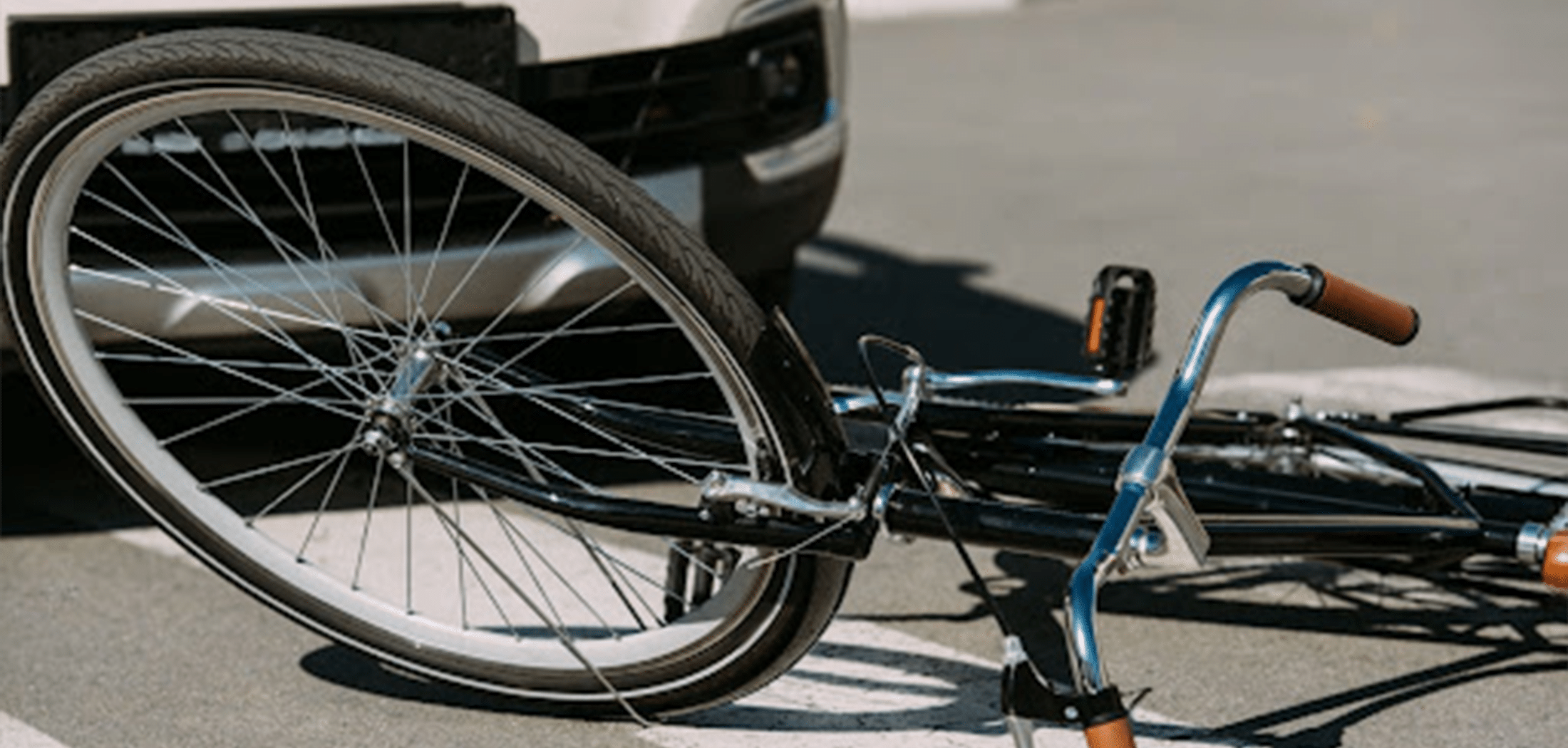 Bicycle on the ground due to an accident