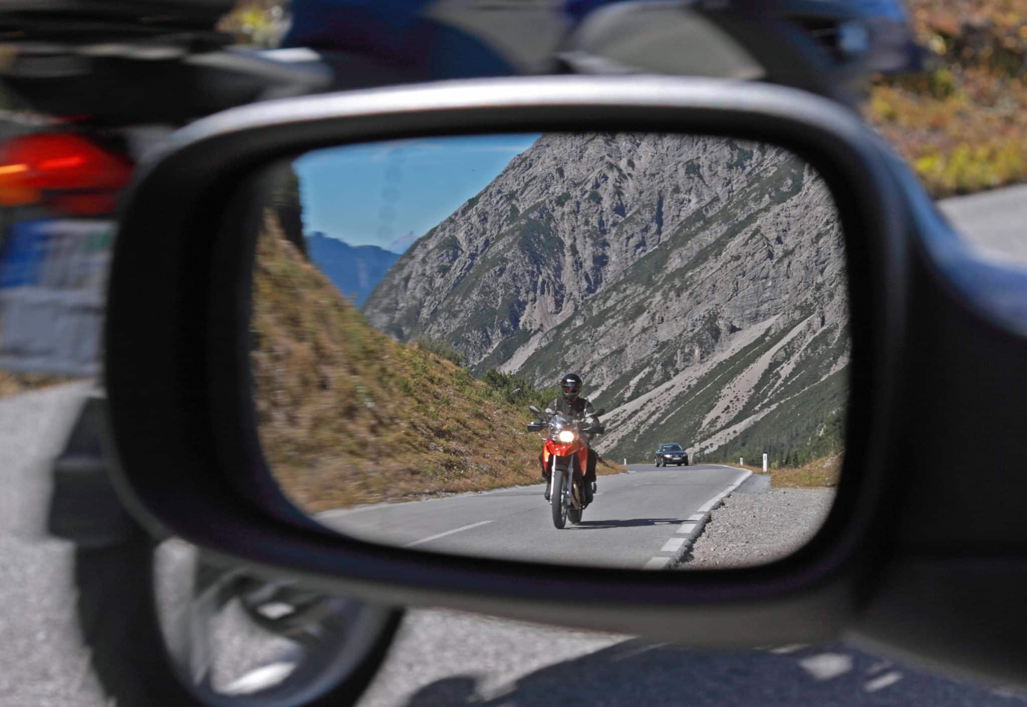 Motorcyclist in the rearview Mirror